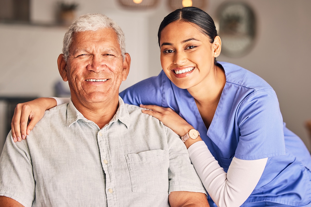 Happy woman, nurse and portrait of senior man with support, medical service and helping patient in retirement. Face of caregiver, elderly person and smile for trust, healthcare and nursing home.